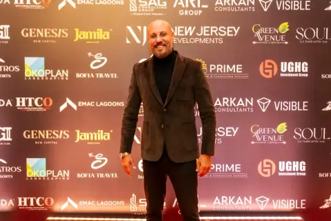 Girgis Youssef at an NJD event backdrop