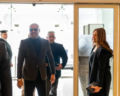 Girgis Youssef arriving at an event with colleagues