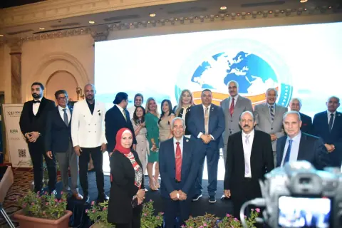 Group on stage at a company event