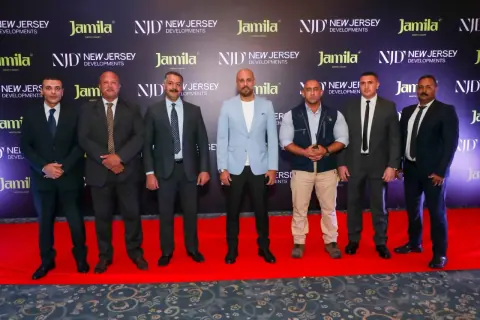 Girgis Youssef at an event backdrop