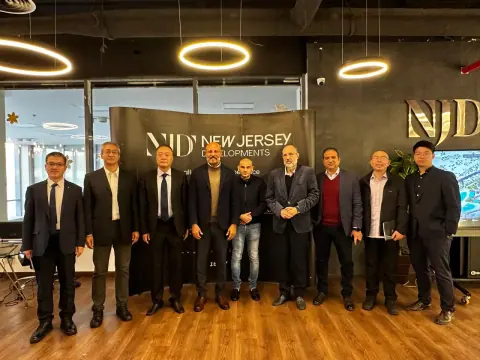 Group photo with the team in an office